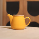 Anna yellow stoneware teapot with bamboo lid